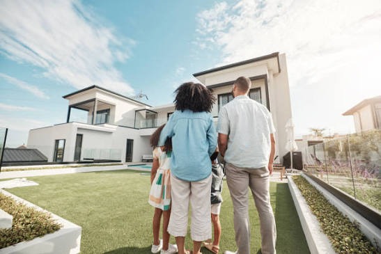Family looking at their modern home together